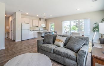 Vinyl plank flooring plus plush carpeting in bedrooms